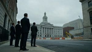 Officials looking at a proposed construction site in Washington.